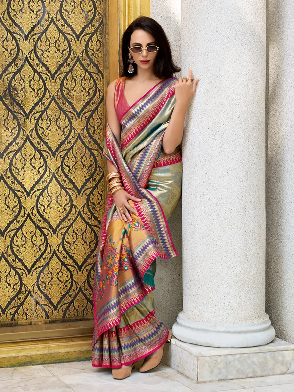 Light blue tissue silk saree in zari weaving