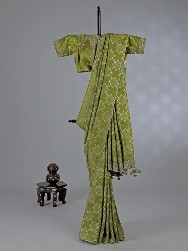 Light green silk saree with ready made blouse