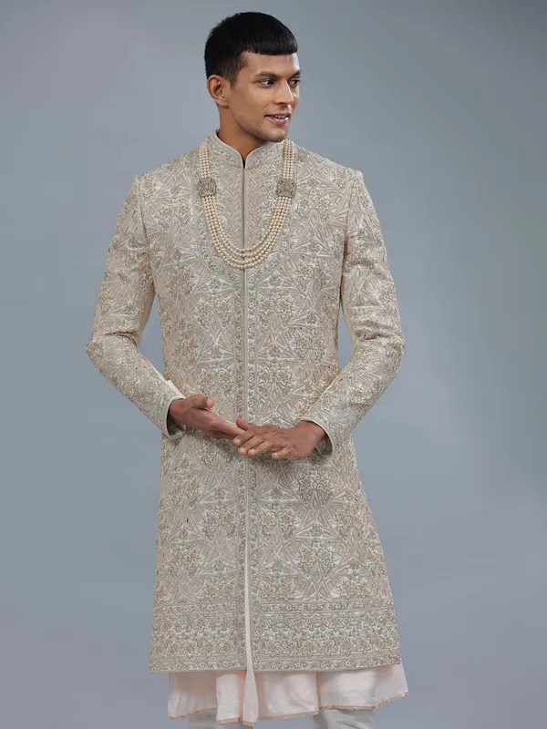 Light peach peshwai style raw silk sherwani