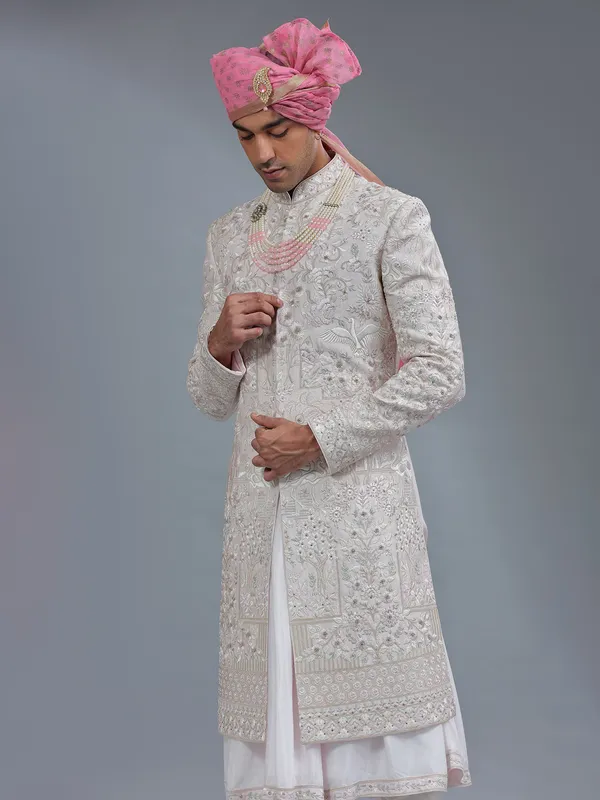 Light pink peshwai style raw silk sherwani