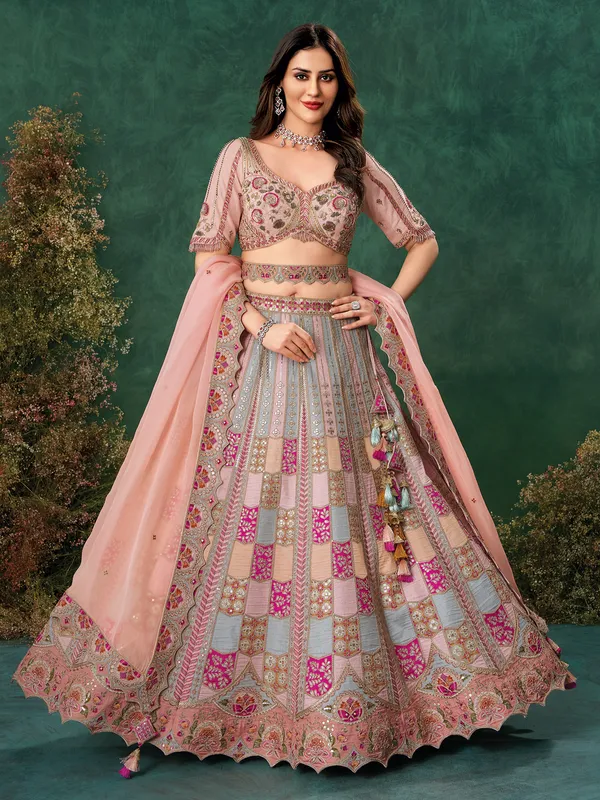 Light pink raw silk lehenga choli for wedding wear
