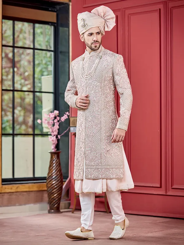 Light pink silk fabricated peshwahi style sherwani