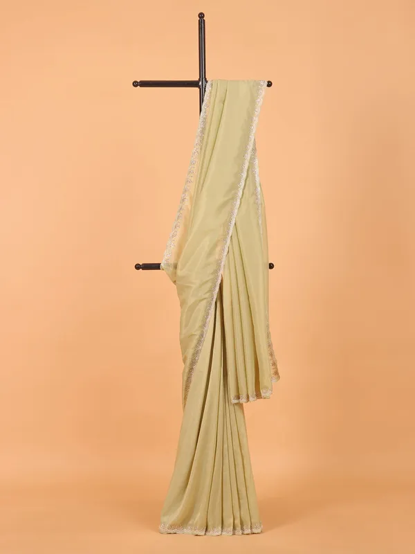 Light pista green organza saree for wedding wear