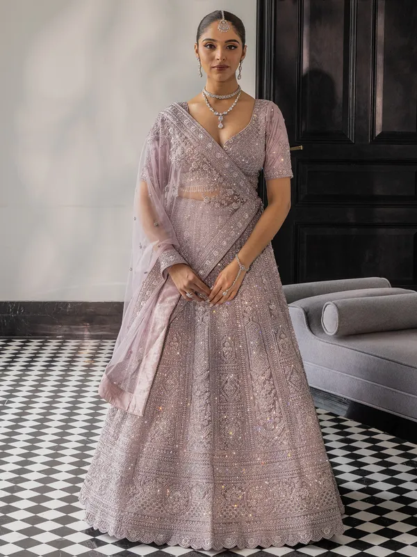 Lilac purple net lehenga choli with sequins work