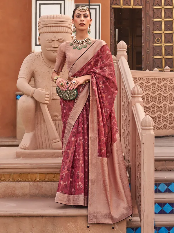 Maroon organza saree with radiant zari weave