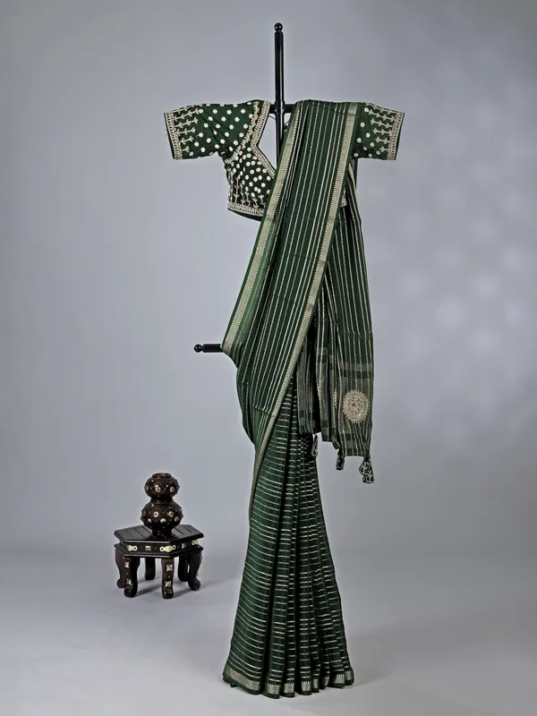 Mehendi green organza saree with sparkling zari work