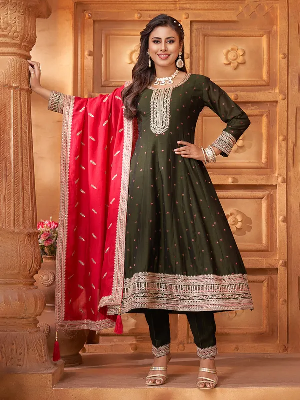 Mehendi green silk salwar suit with red dupatta