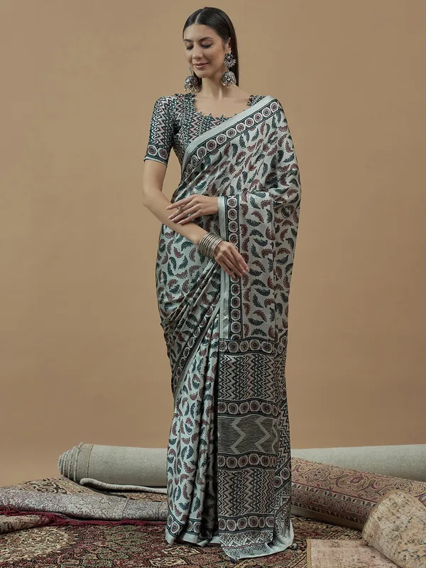 Mint blue printed saree in japan satin