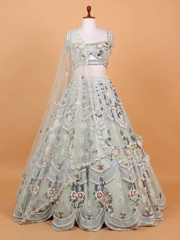 Mint green net lehenga choli with heavy work