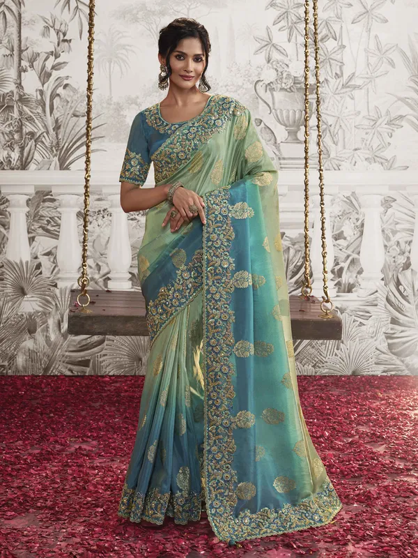 Mint green silk saree with resham work