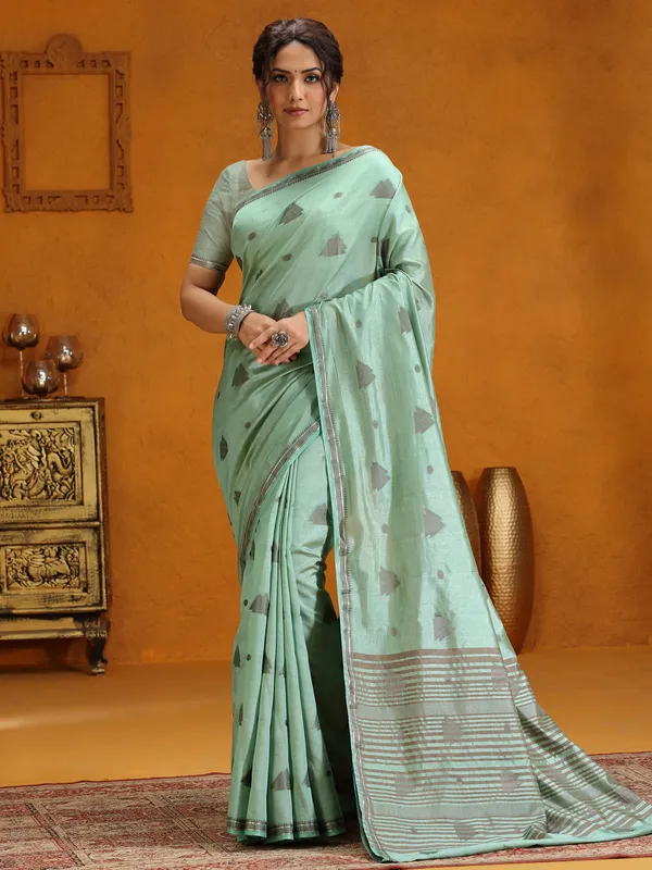 Mint green silk saree with zari weaving