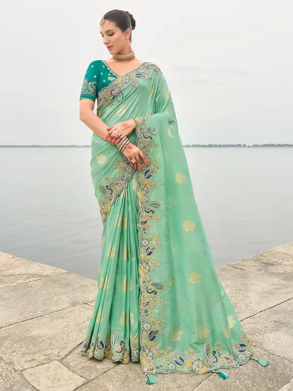 Mint green tissue silk saree with detailing