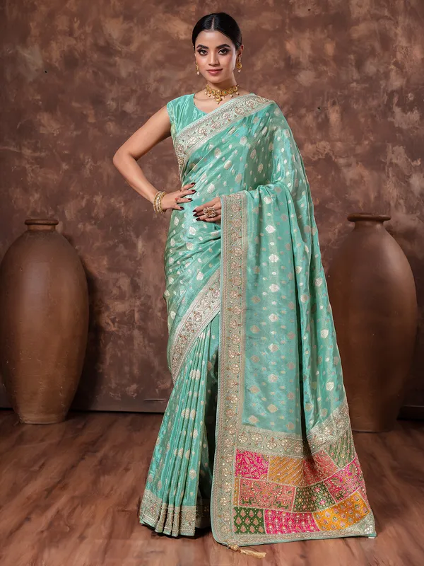 Mint green zari weaving tissue silk saree