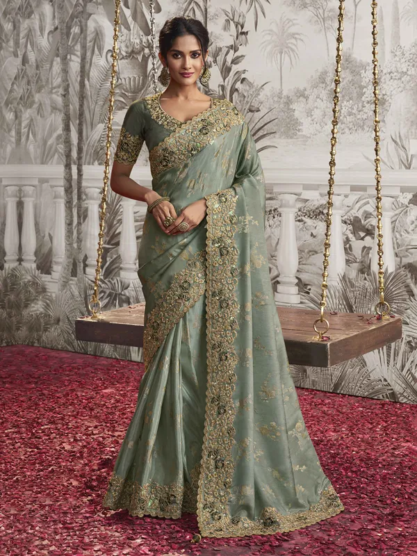 Mint green zari work silk saree