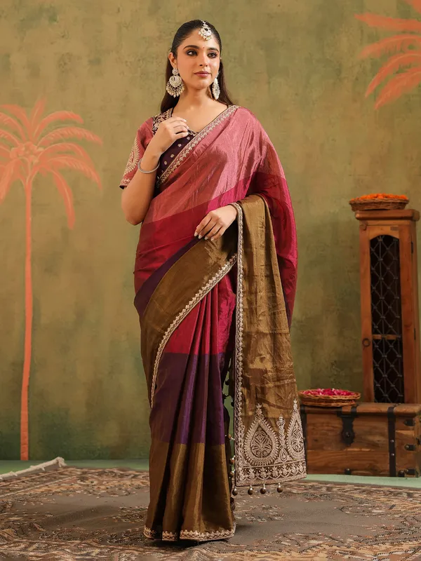 Multicolor tissue silk saree with festive finish