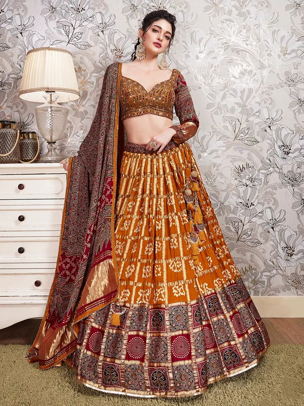 Mustard yellow and maroon silk lehenga choli