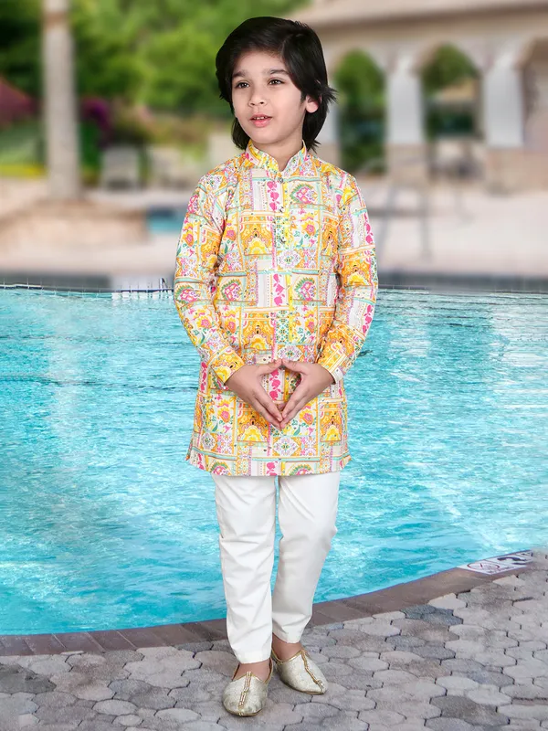 Mustard yellow cotton silk kurta suit with intricate aabla work
