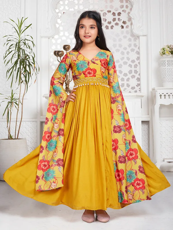 Mustard yellow georgette printed gown