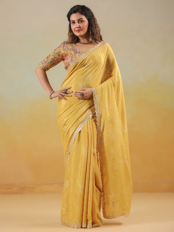 Mustard yellow printed saree in muslin