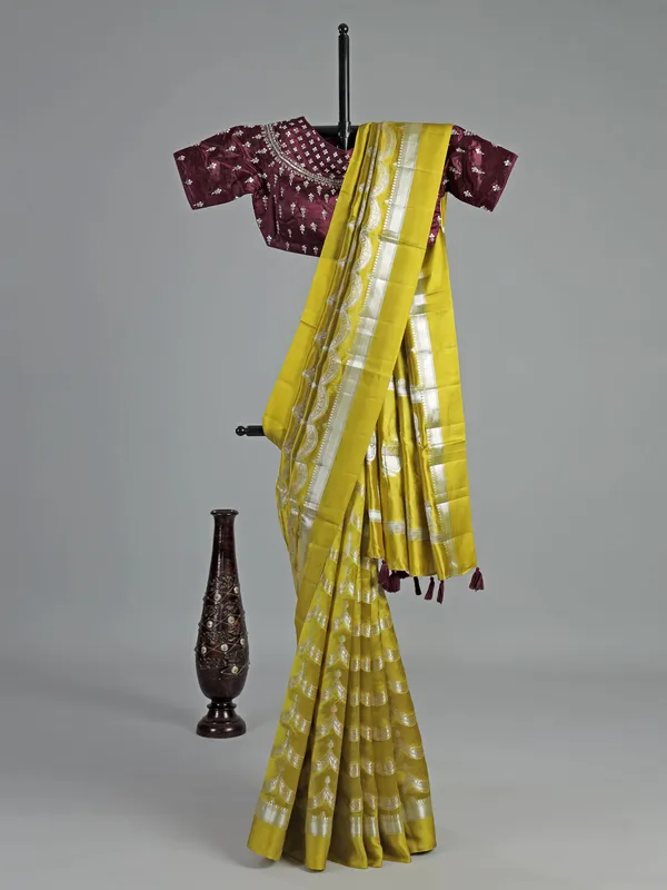 Mustard yellow saree with embroidered blouse charm