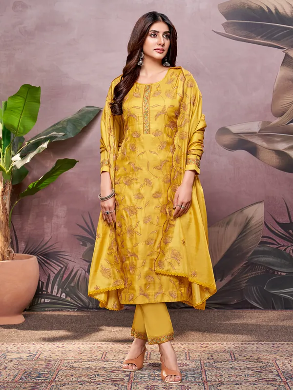 Mustard yellow silk embroidered salwar suit for haldi