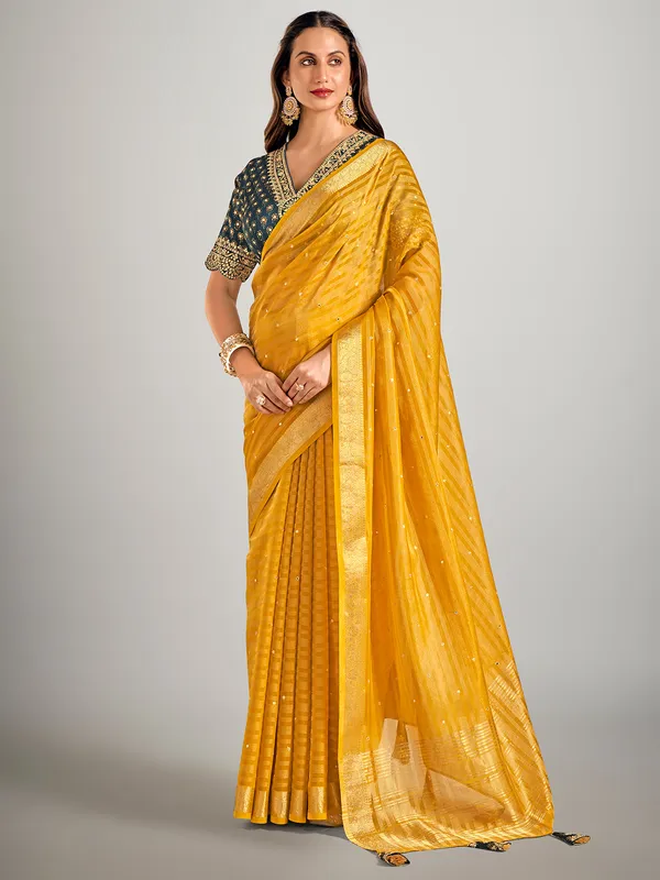 Mustard yellow soft organza saree