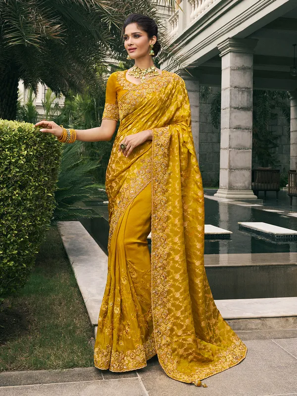 Mustard yellow tissue silk saree for festive flair