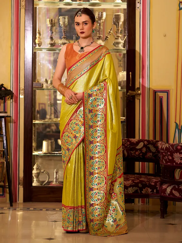Mustard yellow tissue silk saree with zari weaving