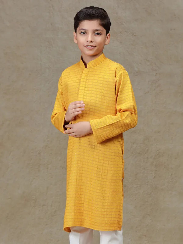 Mustard yellow zari worked silk kurta suit