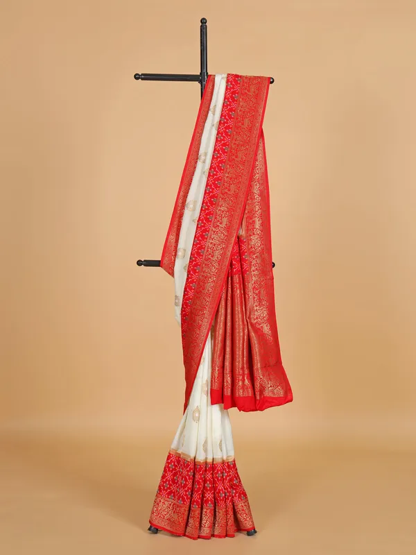 Off-white and red patola silk saree for wedding wear