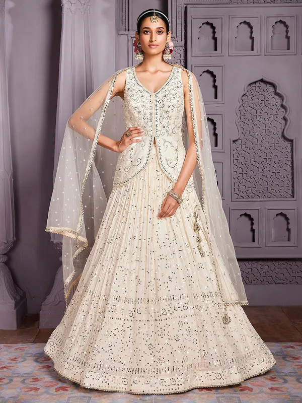 Off white chinnon lehenga with ready made blouse
