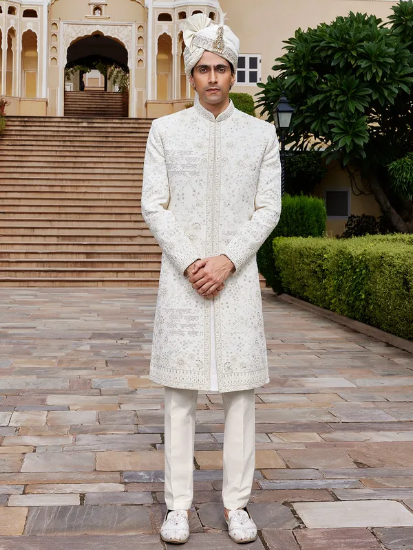 Off white raw silk sherwani for wedding with fine embroidery