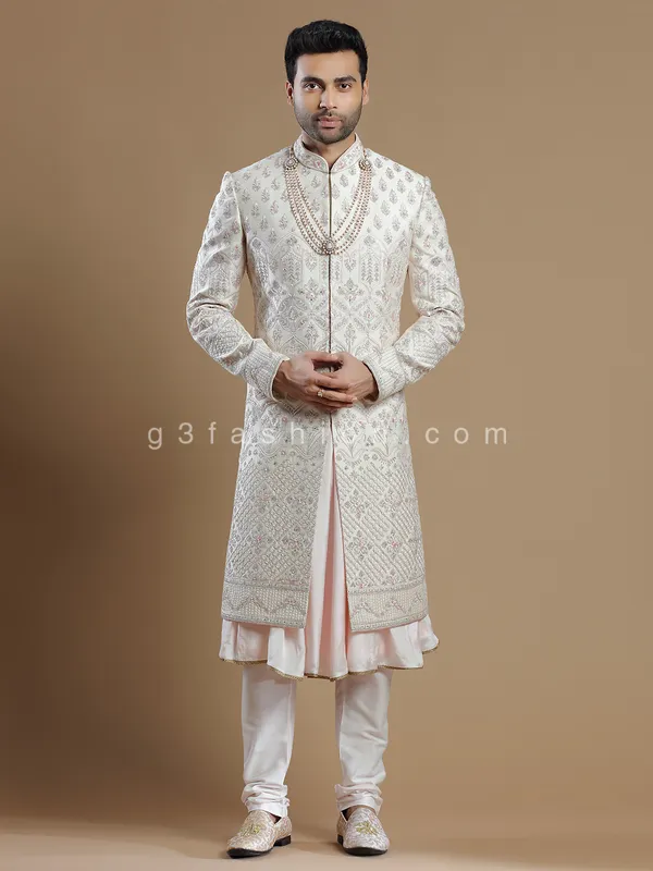Off white rich raw silk groom wear sherwani