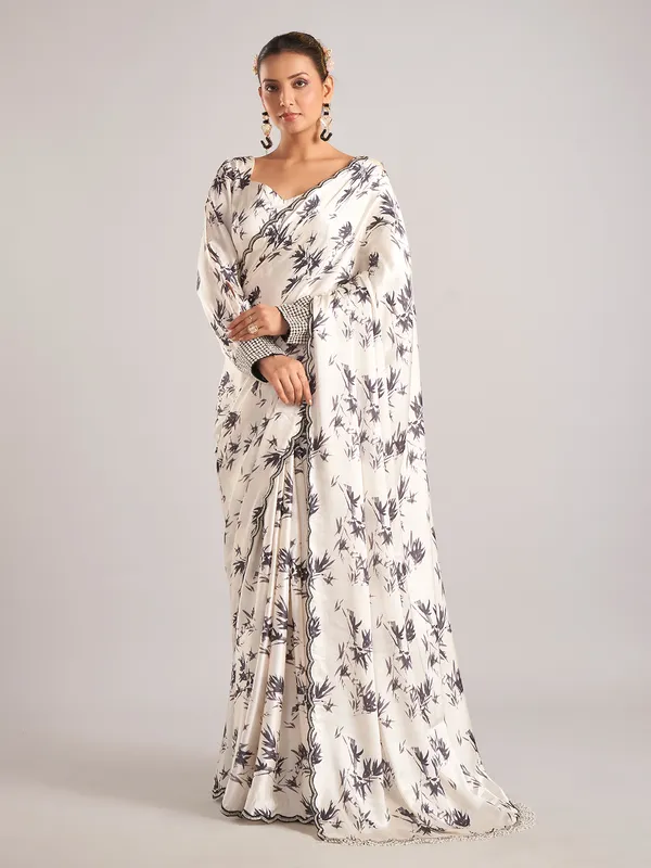 Off white satin saree with cutdana work