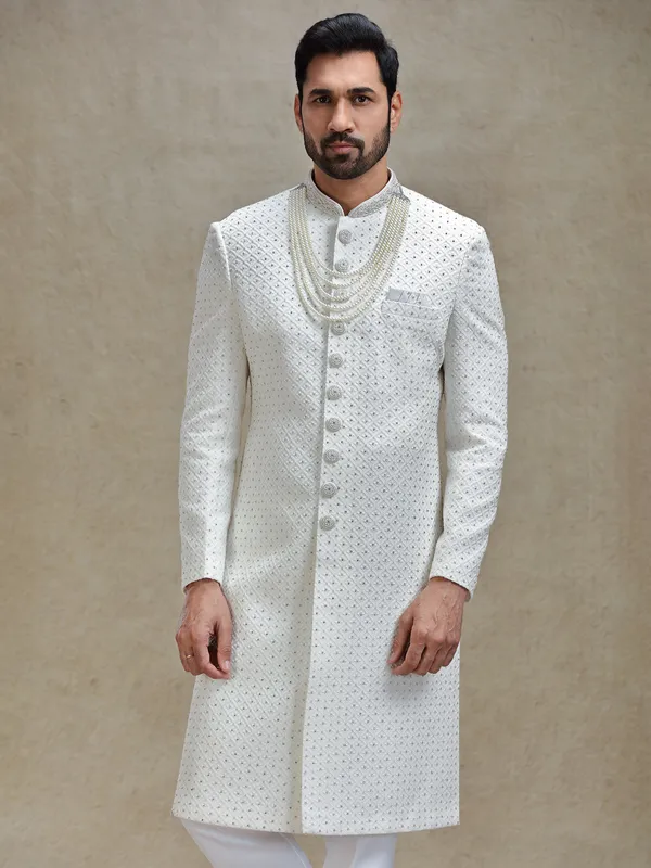 Off white silk fabricated sherwani in embroidery