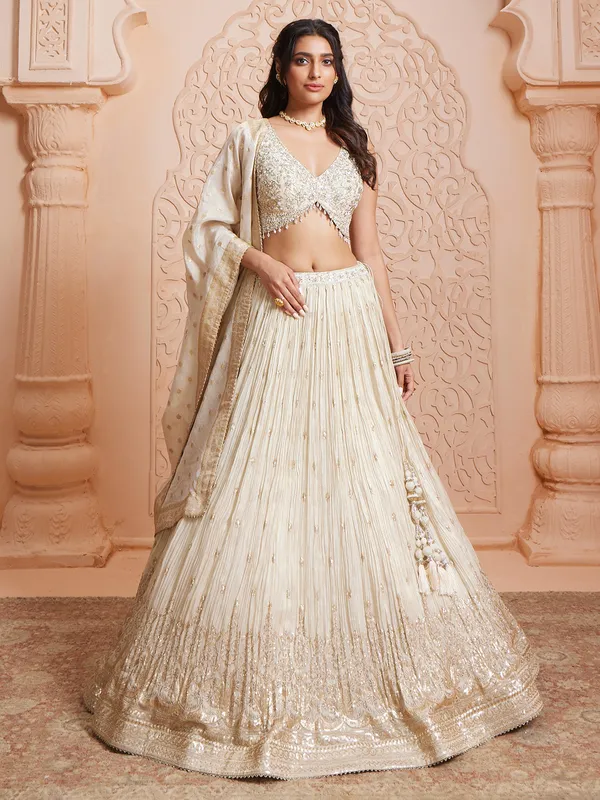 Off white tissue lehenga choli with dupatta