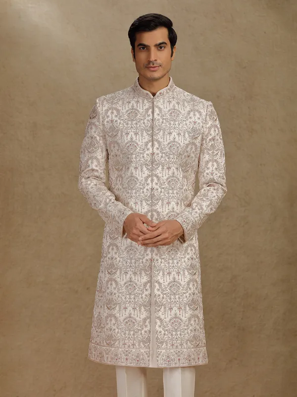 Opulent gold silk sherwani for wedding occasions