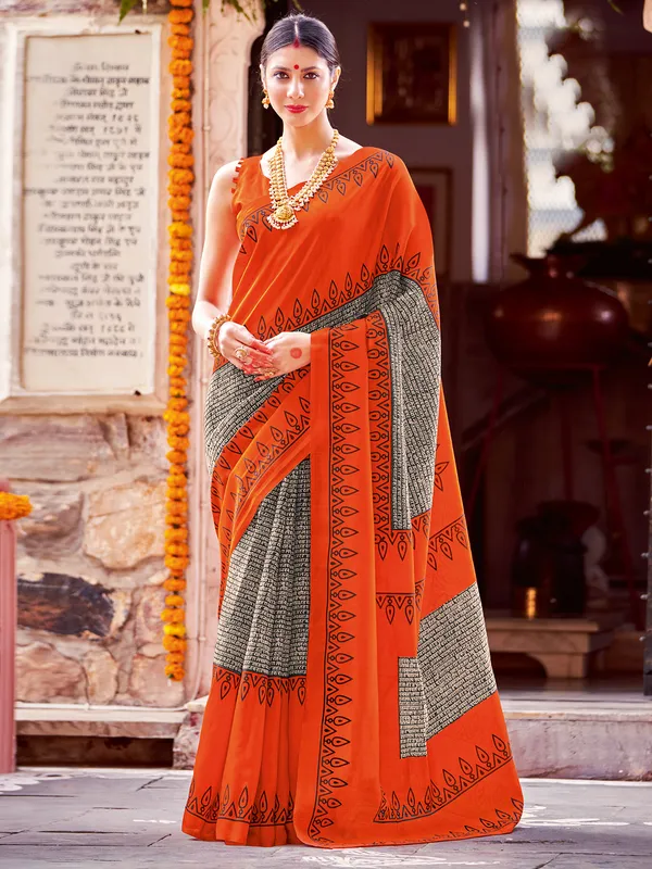 Orange and black printed bhagalpuri silk saree