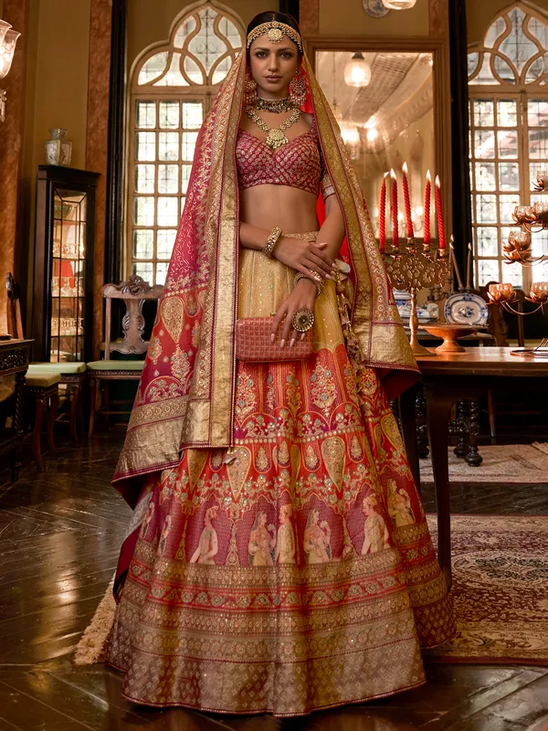 Orange and pink printed silk lehenga choli