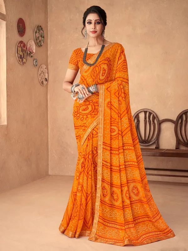 Orange bandhani printed saree in chiffon