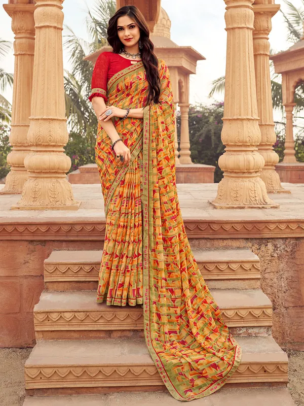 Orange chiffon saree with chic print