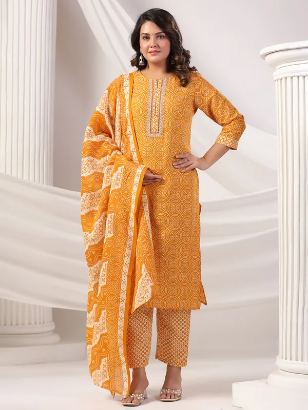 Orange color silk kurti set in printed