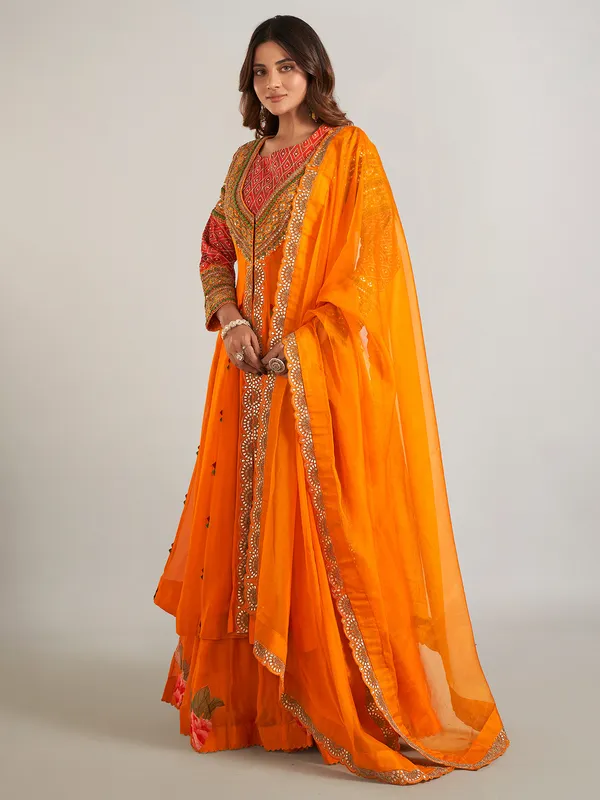 Orange georgette jacket style lehenga suit