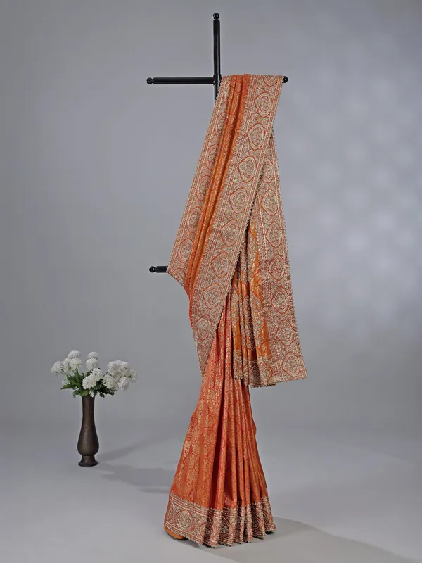 Orange kanjivaram silk blouse with regal zardosi work