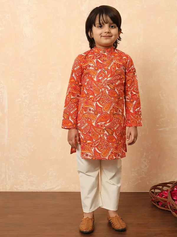 Orange kurta suit in printed pattern for festive wear