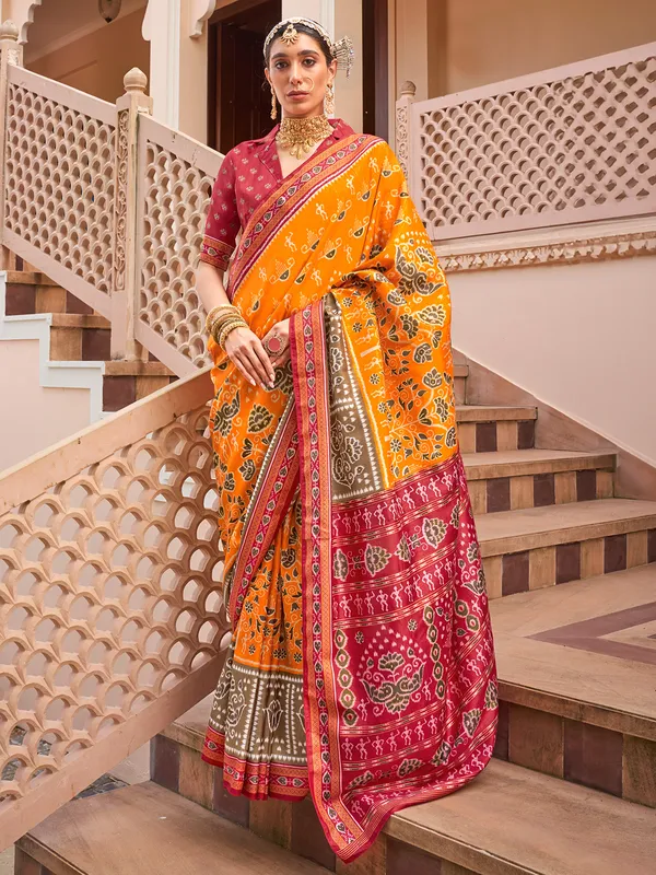 Orange printed silk saree for wedding wear