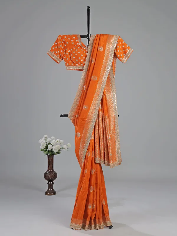 Orange silk saree with readymade designer blouse