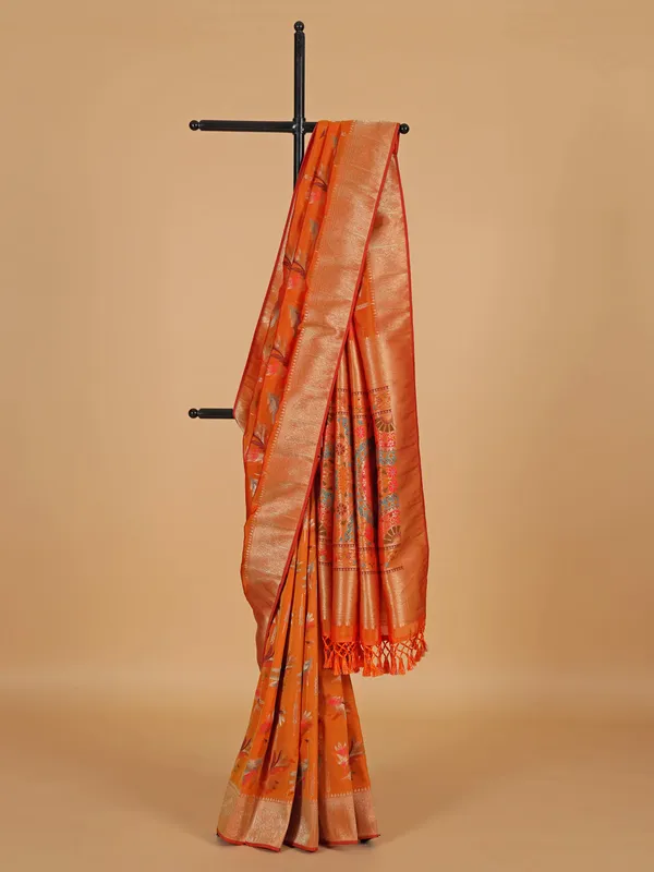 Orange silk saree with slluring motifs