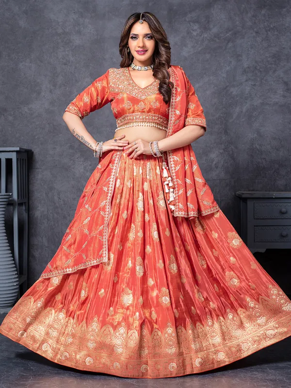 Orange silk sequins worked lehenga choli