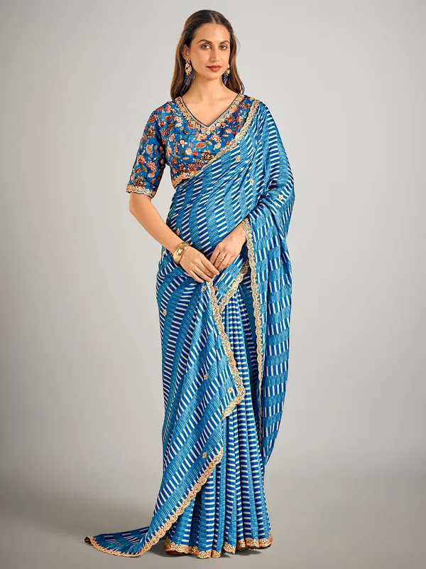 Pastel blue printed crepe silk saree